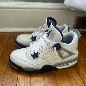 White and Gray Sneakers with Black Accents